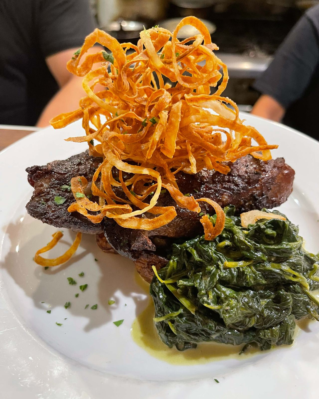 Steak with crispy onions