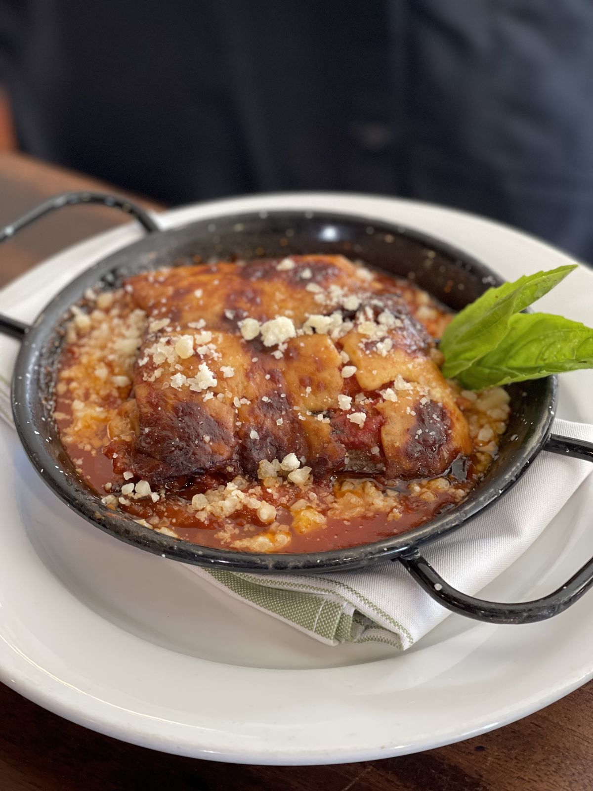 Baked dish with fresh basil