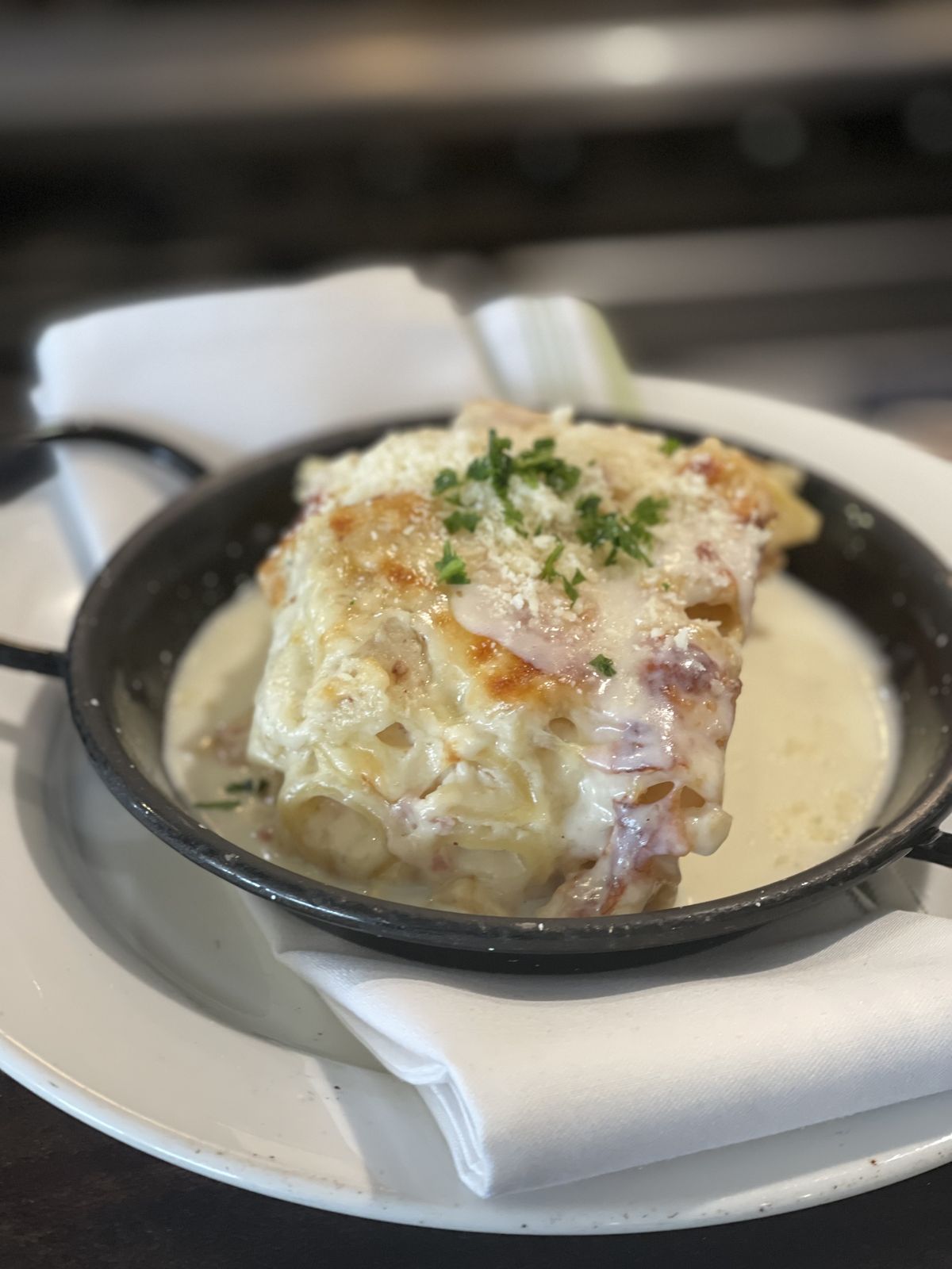 Pasta gratin in a cast-iron dish
